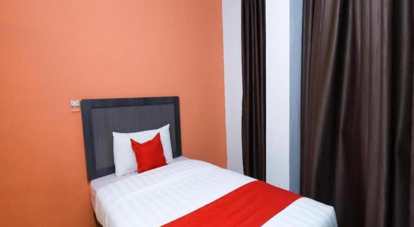 Oyo 1111 Harmony Stay Miri Exterior photo